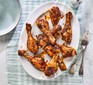 Baked chicken drumsticks on a plate