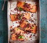 Pomegranate salmon in a roasting tin