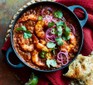 One-pot prawn & lentil curry served in a casserole dish