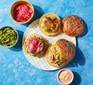 Prawn & lime guacamole burgers on a serving board