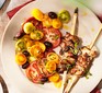 Preserved lemon chicken skewers with summer tomato salad