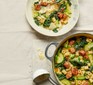 Sausage & kale minestrone in a large pot and bowl