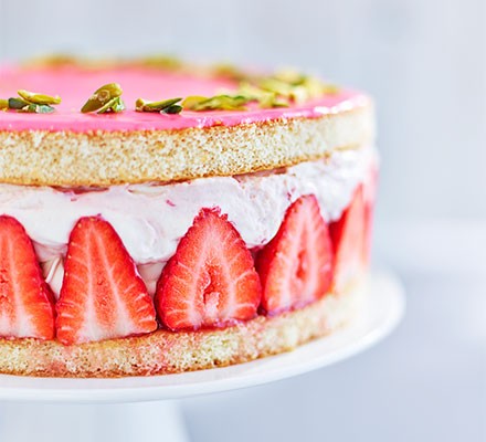 Strawberry & elderflower gateau served on a cake stand