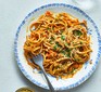 Jackfruit bolognese with vegan parmesan on a plate